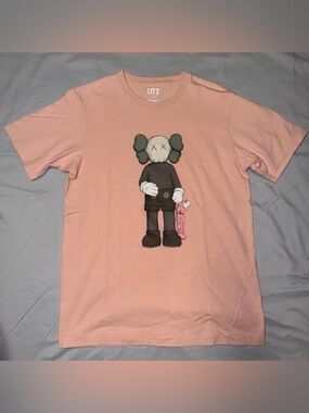Uniqlo x KAWS Pink Graphic Tee
